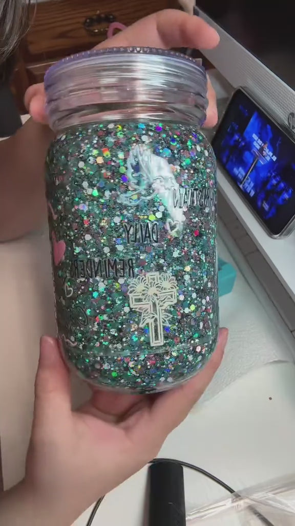 20oz plastic snow globe tumbler with lid and straw.